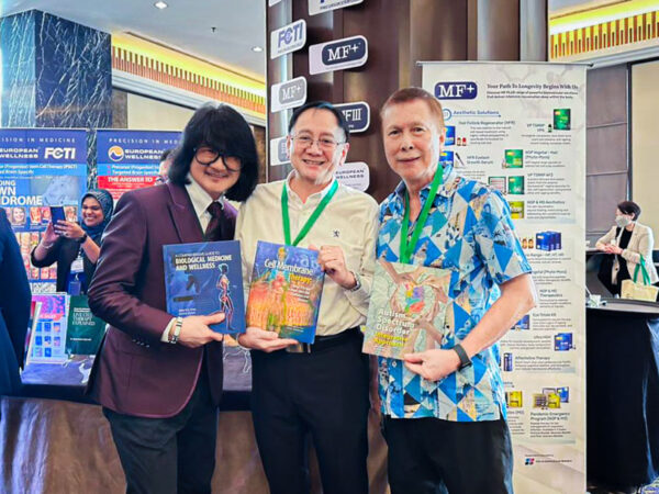 Happy doctors holding their books