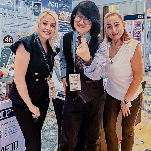 Dr. Valerie F. Civelli (left) with Prof. Mike Chan following his groundbreaking presentation on targeted organ regeneration at the Intercontinental Convention Centre Bangkok.