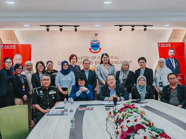 Collaborative Effort for Biotech Advancement: A group photo capturing the diverse team of professionals from various ministries and agencies, symbolizing a unified push for industrial development in Sabah.