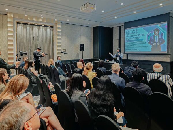 Prof. Mike Chan addresses the audience during his keynote presentation on regenerative medicine at AMWC SEA 2024 in Bangkok.