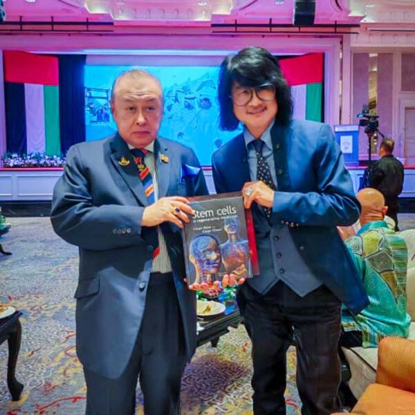 Prof. Mike Chan presented a copy of his stem cell book to HRH Tengku Sulaiman Shah Al-Haj ibni Almarhum Sultan Salahuddin Abdul Aziz Shah Al-Haj (brother of the current Sultan of Selangor, Sultan Sharafuddin Idris Shah Al-Haj.) at the UAE 53rd National Day event.