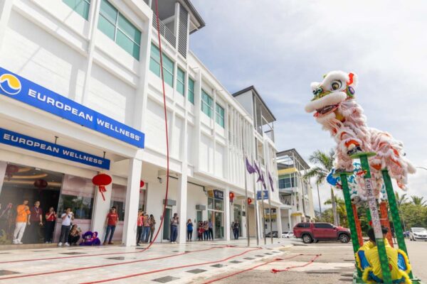 The team at European Wellness celebrates the New Year, capturing memories with the lions at their new center.